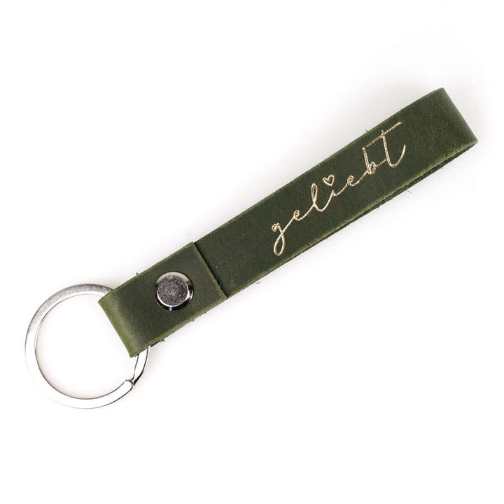 Schlüsselanhänger "geliebt" · Echtes Leder · Grün Goldglanz Prägung