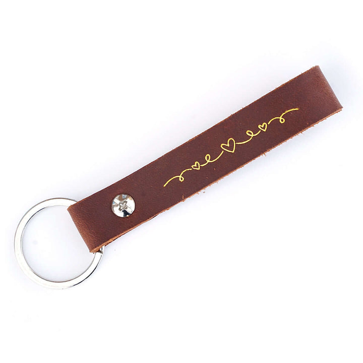 Schlüsselanhänger "geliebt" · Echtes Leder · Cognac Goldglanz Prägung