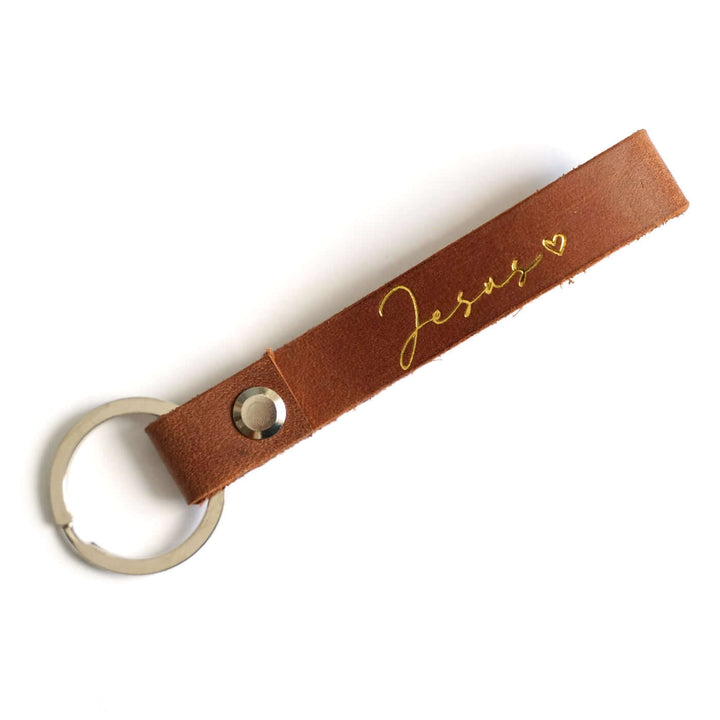 Schlüsselanhänger "Jesus" · Echtes Leder · Cognac Goldglanz Prägung – Aus Gnade